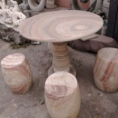 old millstone table grinding stone with wheel