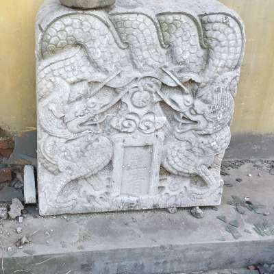 antique stone monument head